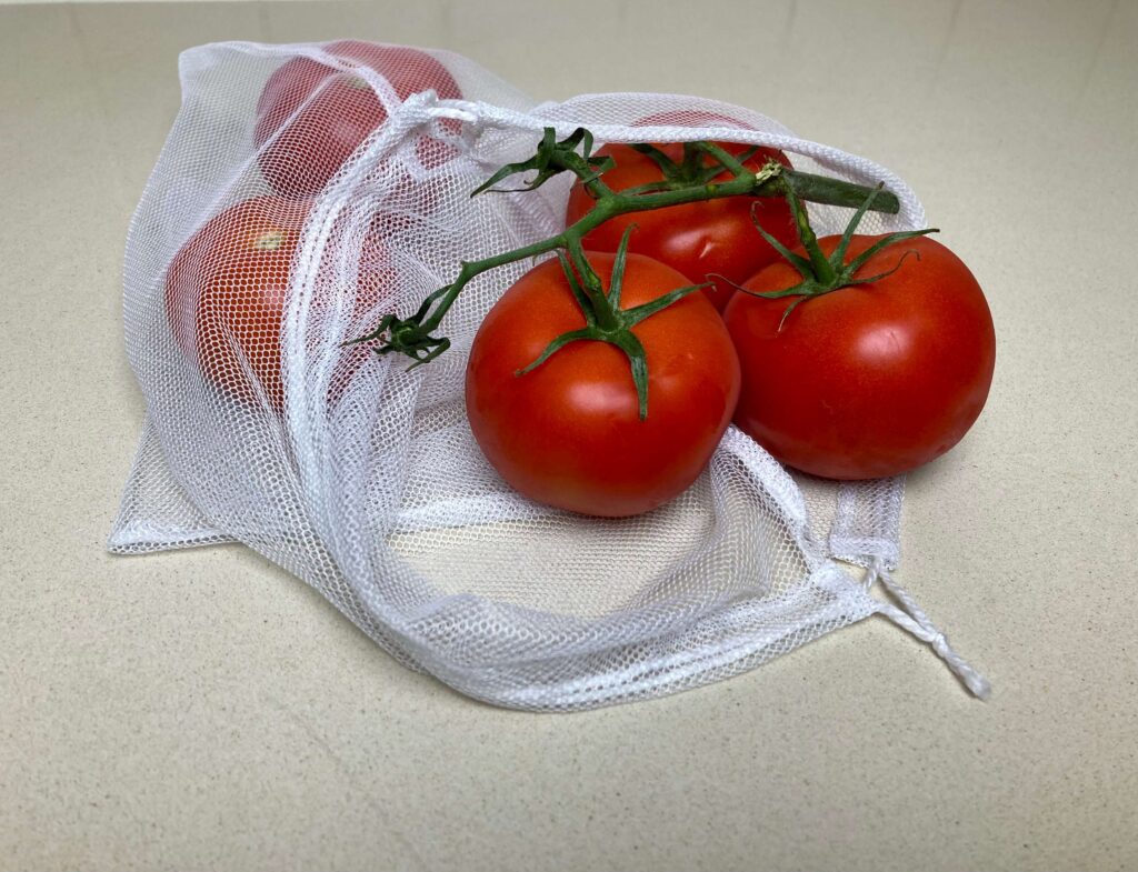 Sustainable sewing example: Reusable produce bags made of bug mesh bought in op shop